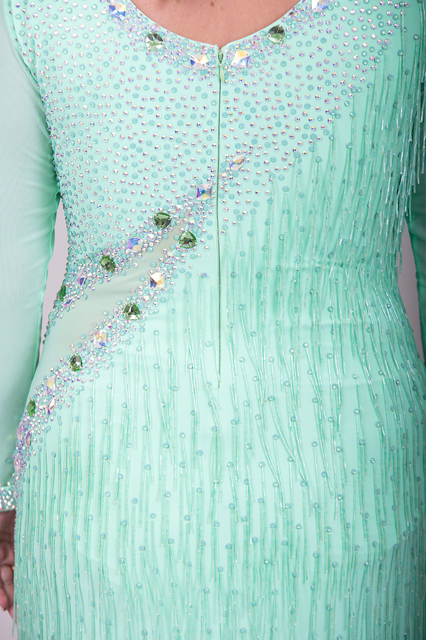 192 Mint Green Latin Dance Dress. Front mesh panel detail with flesh Lycra under so not see through. Stoned in AB and mint ab stones. Mint Green bead droppers. High back giving option to wear own bra.