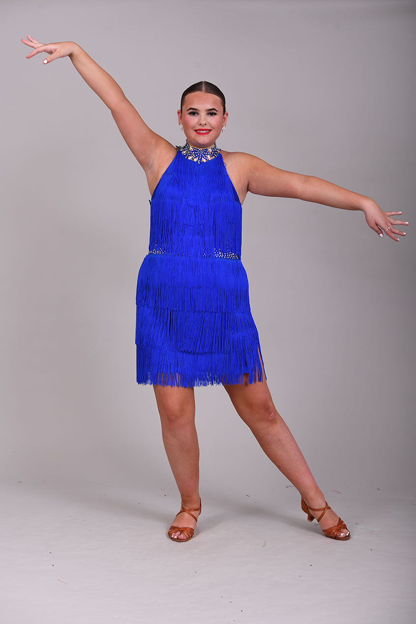 221 Bright Royal Blue Fringed Leotard & separate fringe skirt. Appliqué detailing to the waistband & Collar with flesh Lycra panels to the sides decorated in appliqué. All stones are AB & Sapphire.