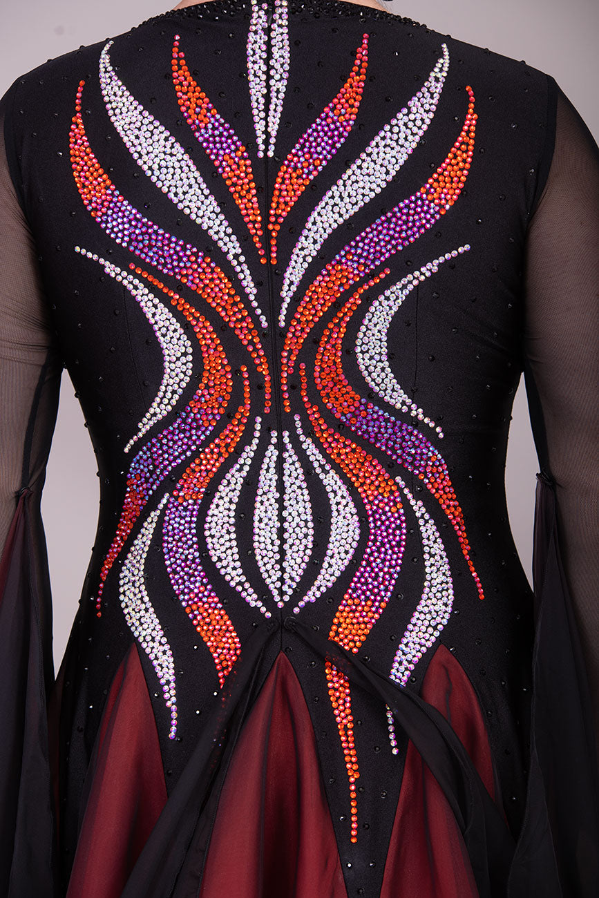 39B Red Black & Orange Ombre Competition Ballroom/Sequence Dance Dress. Ombre stoning in Oranges through to AB. Black & Red Ombre skirts with full back coverage. Detachable Floats complete this beautiful dress