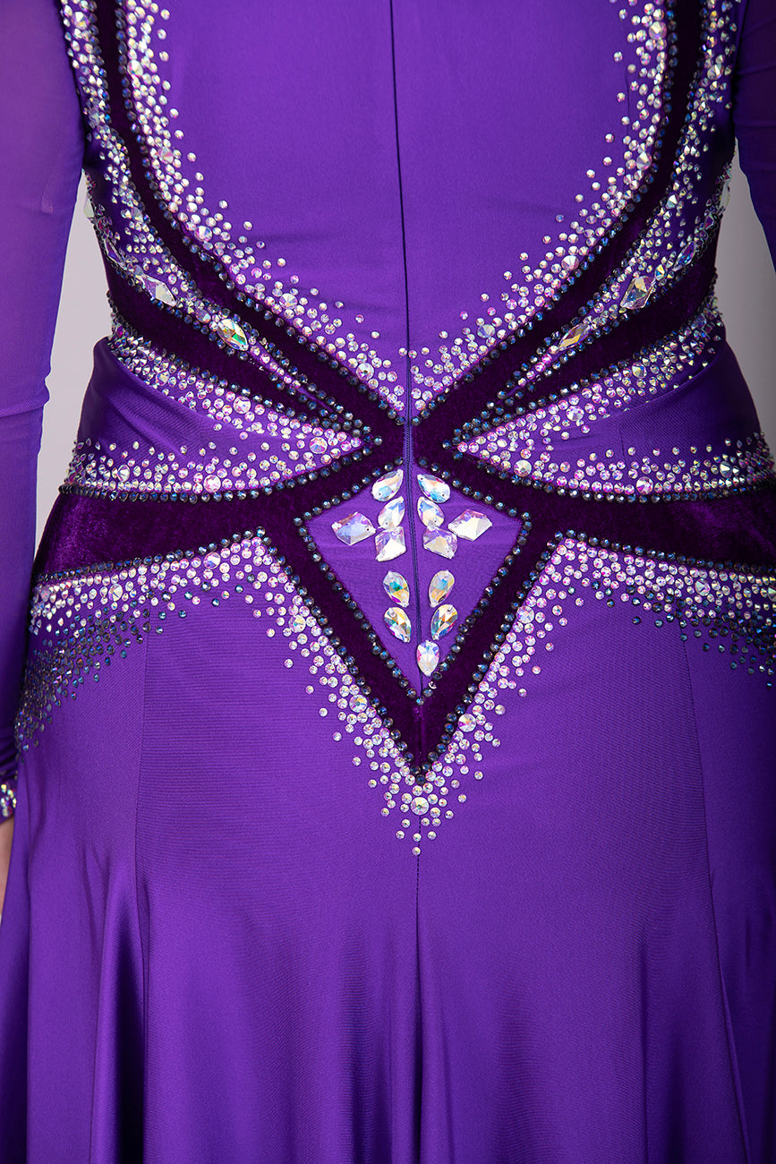 041 Cadbury Purple Competition Latin Dance Dress. Deep purple contrast pattern heavily stoned in AB & Amethyst AB. Bold & Flattering design. Full skirt giving maximum movement.
