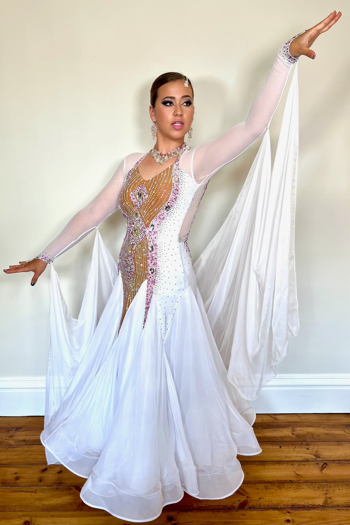 247 White and Tan Ballroom Dress. Stunning decoration stoned in AB & light rose. Floats to sleeves & back.