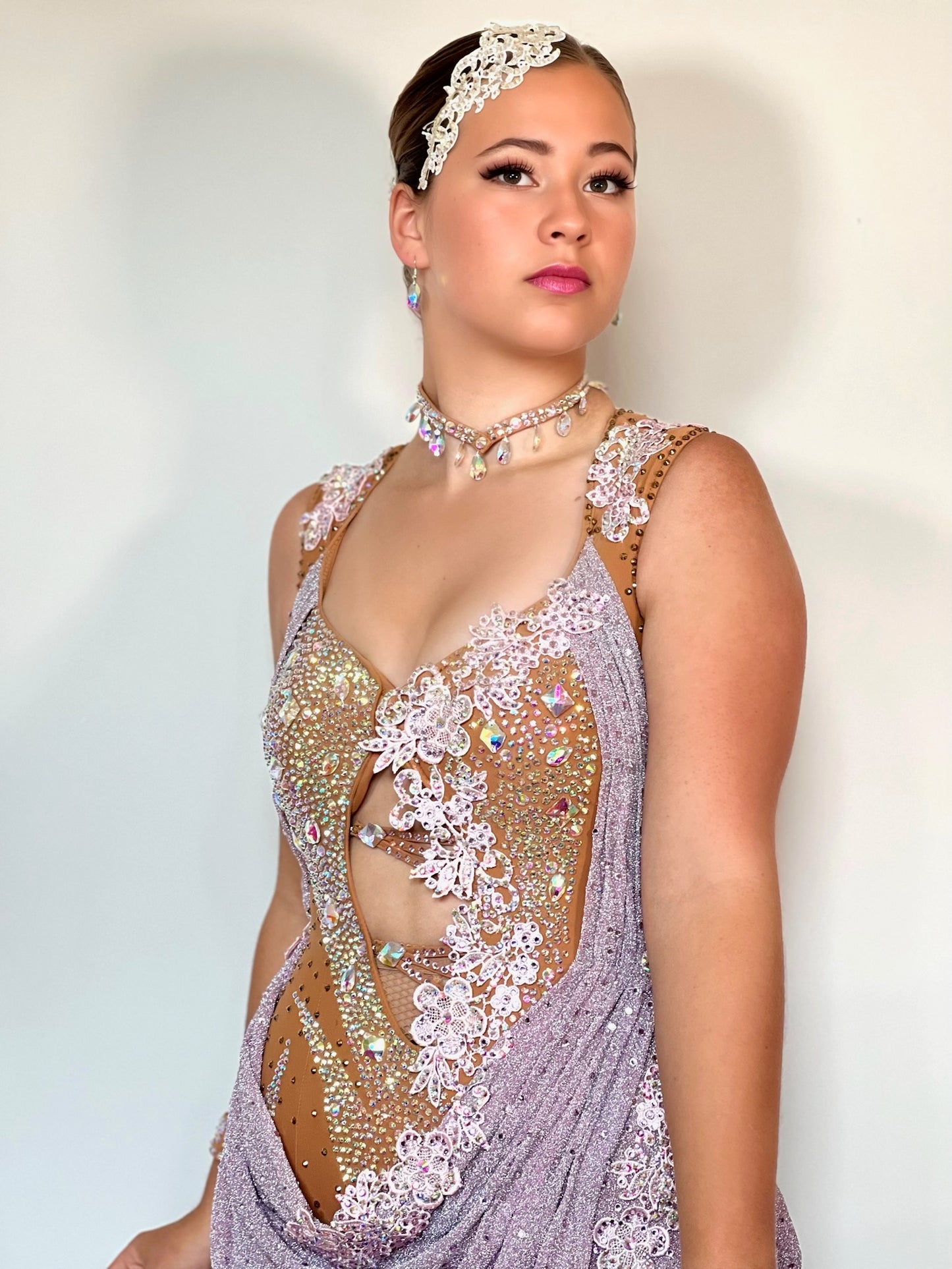 342 Lilac Heavily decorated Latin Dress. Decorated with lilac flowers with full back. Front fastening (no crotch poppers). Decorated with lilac & AB stones