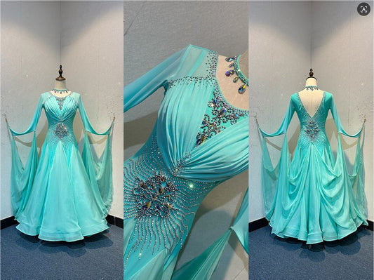 73B Pretty Mint Green Competition Ballroom Dance Dress. Stoned in AB with mesh overlay to the upper chest. Detachable Floats. ❤️Showroom Appointments Available❤️