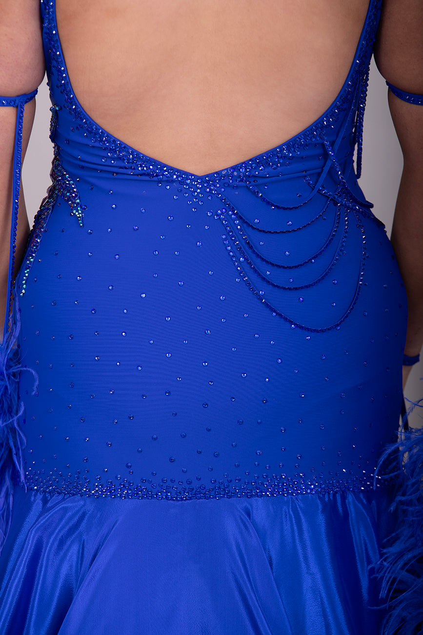 9000 Striking Bright Royal Blue Ballroom Dress. Decorated in sapphire, sapphire AB & aqua. Comes with x2 sets of Detachable floats & stunning necklace.