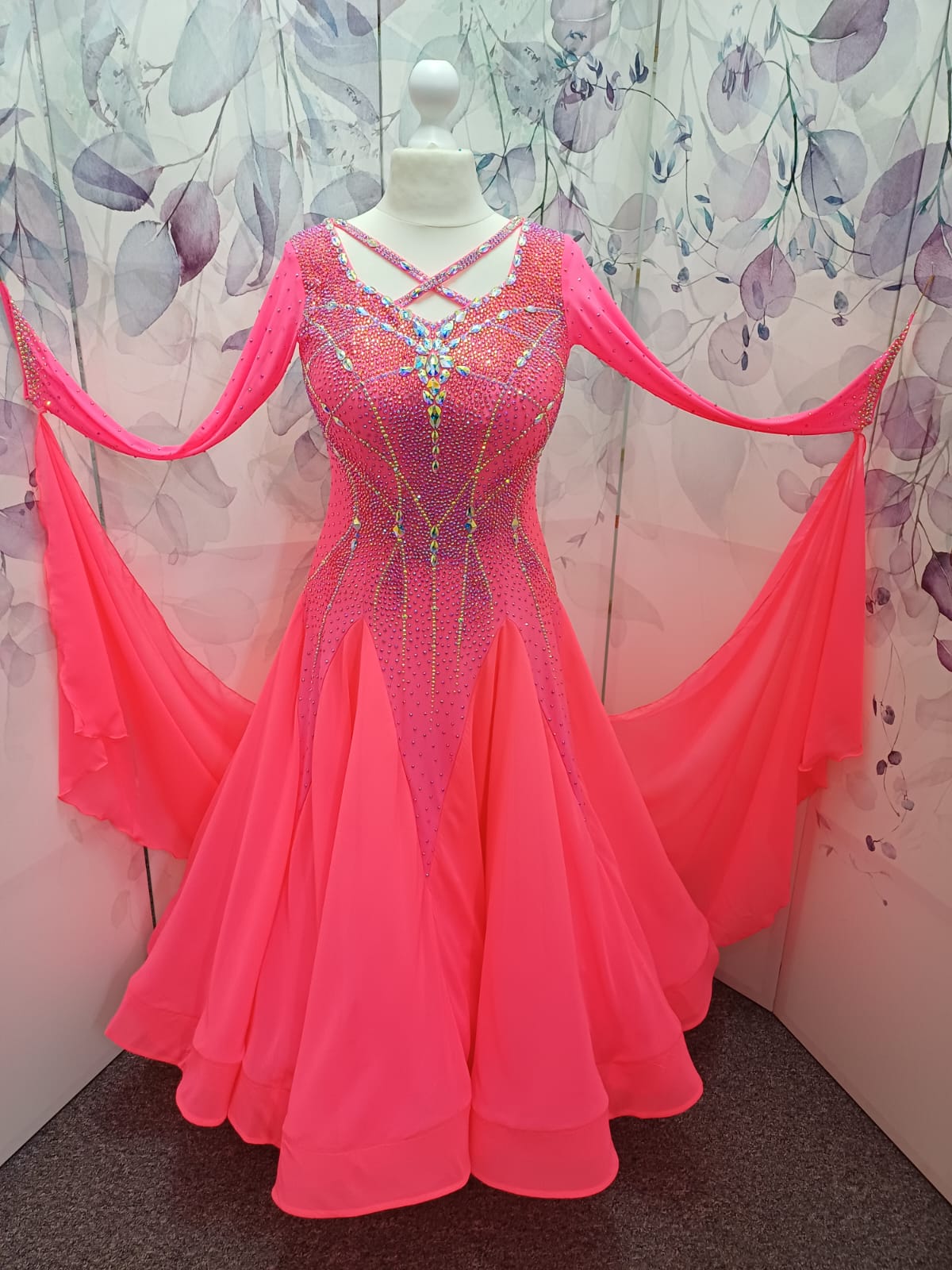 66B Coral Competition Ballroom Dance Dress. Striking decoration in AB, Coral & Coral AB. Strappy detail to upper chest & back. High back for option to wear own Bra. Detachable Floats ❤️Showroom Appointments Available❤️