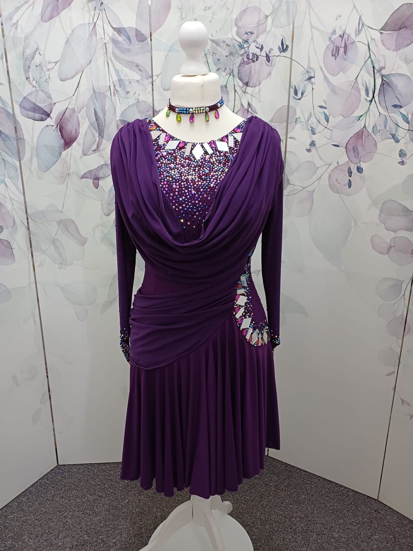 66L Plum Competition Latin Dance Dress. Heavily stoned with AB, Amethyst & Amethyst AB with mirrors. Sash detail to front, back & hip. Could be removed. High back to wear own Bra. ❤️Showroom Appointments Available❤️