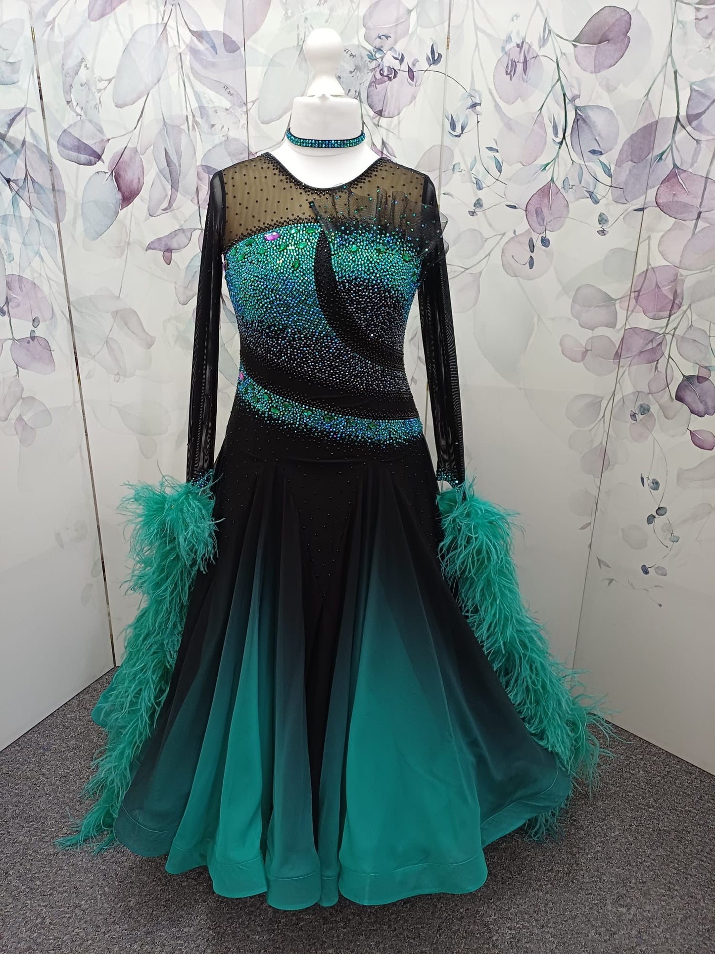70B Stunning Black & Blue Zircon Competition Ballroom Dance Dress. Heavily stoned in Blue Zircon & jet with detachable Ostrich boa floats. ❤️Showroom Appointments Available❤️