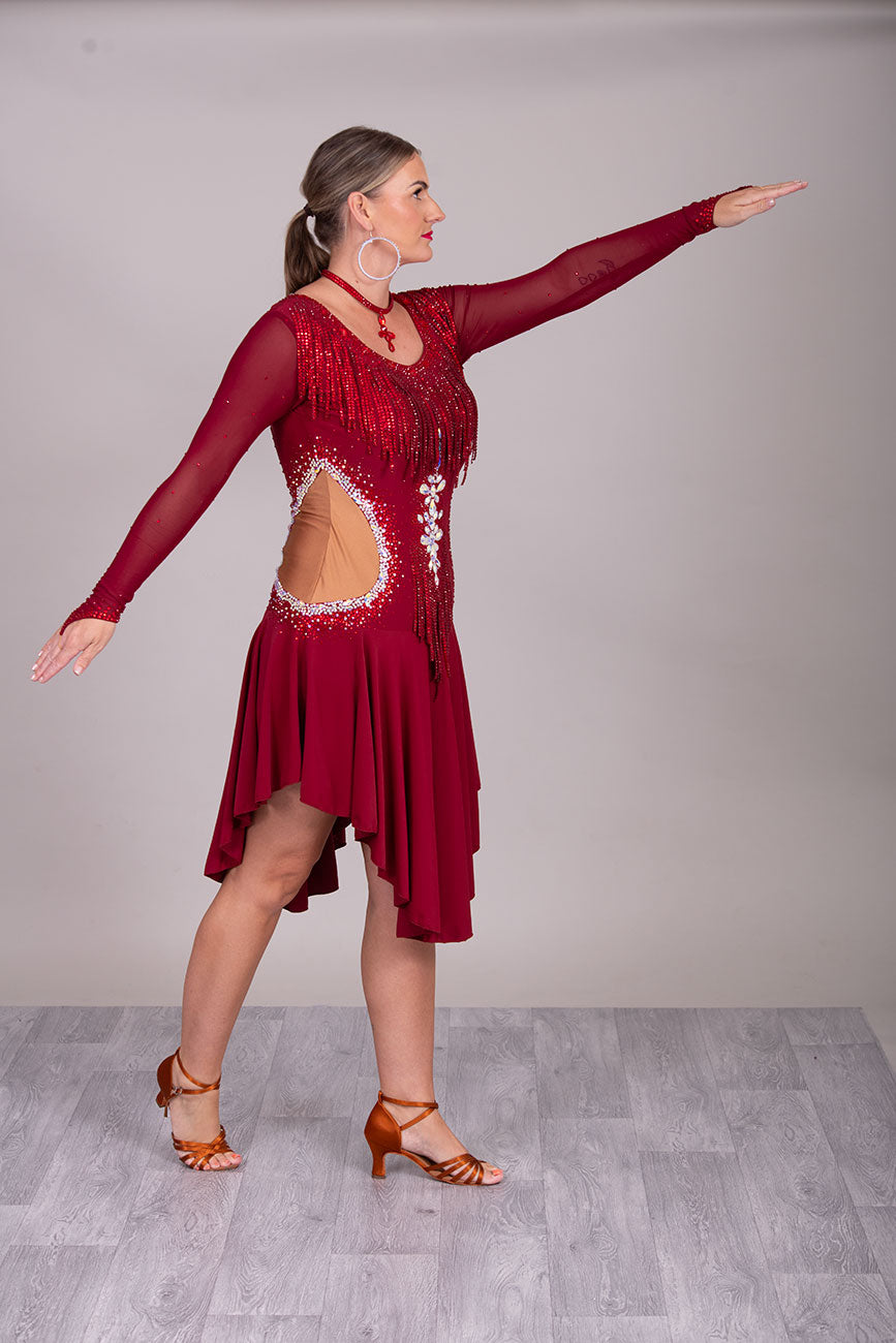 052 Wine Colour Latin Competition Dance Dress with heavily stoned stunning design in AB & Dark Siam High Mesh Back to give option of wearing own Bra. Flesh colour Lycra side panels (not see through) giving the illusion of cut outs.