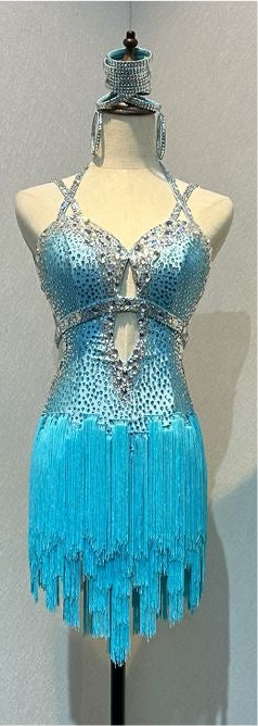 47L Paradise Blue Competition Latin Dance Dress. Beautiful detailing throughout with open design & strap details to the front. Comes with 8 bangles & matching Earrings. ❤️Showroom Appointments Available❤️
