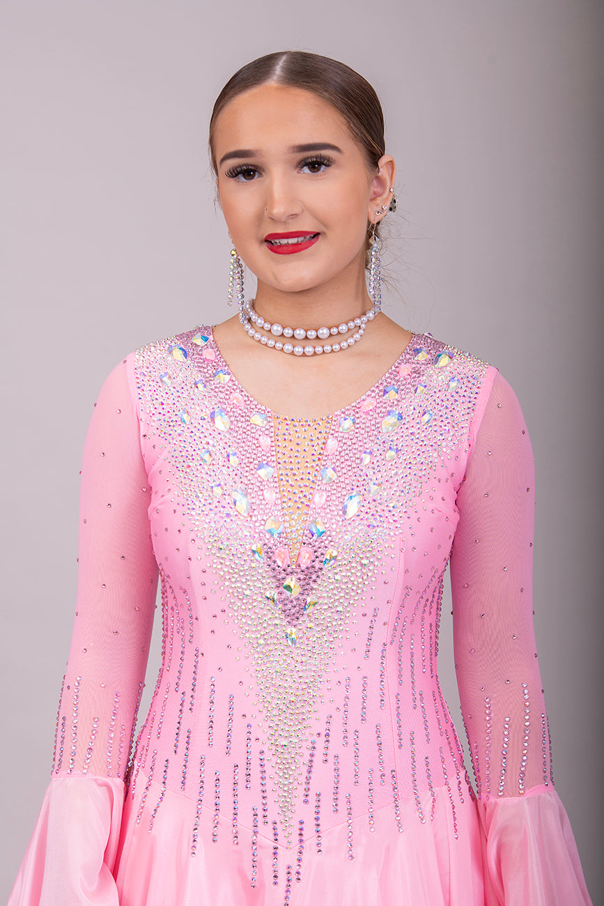 01B Ballroom/Sequence Competition Dance Dress. Sugar Pink Pearl Chiffon stoned in AB & Light Rose. Comes with Pearl Necklace. Filled in mesh back for modesty.