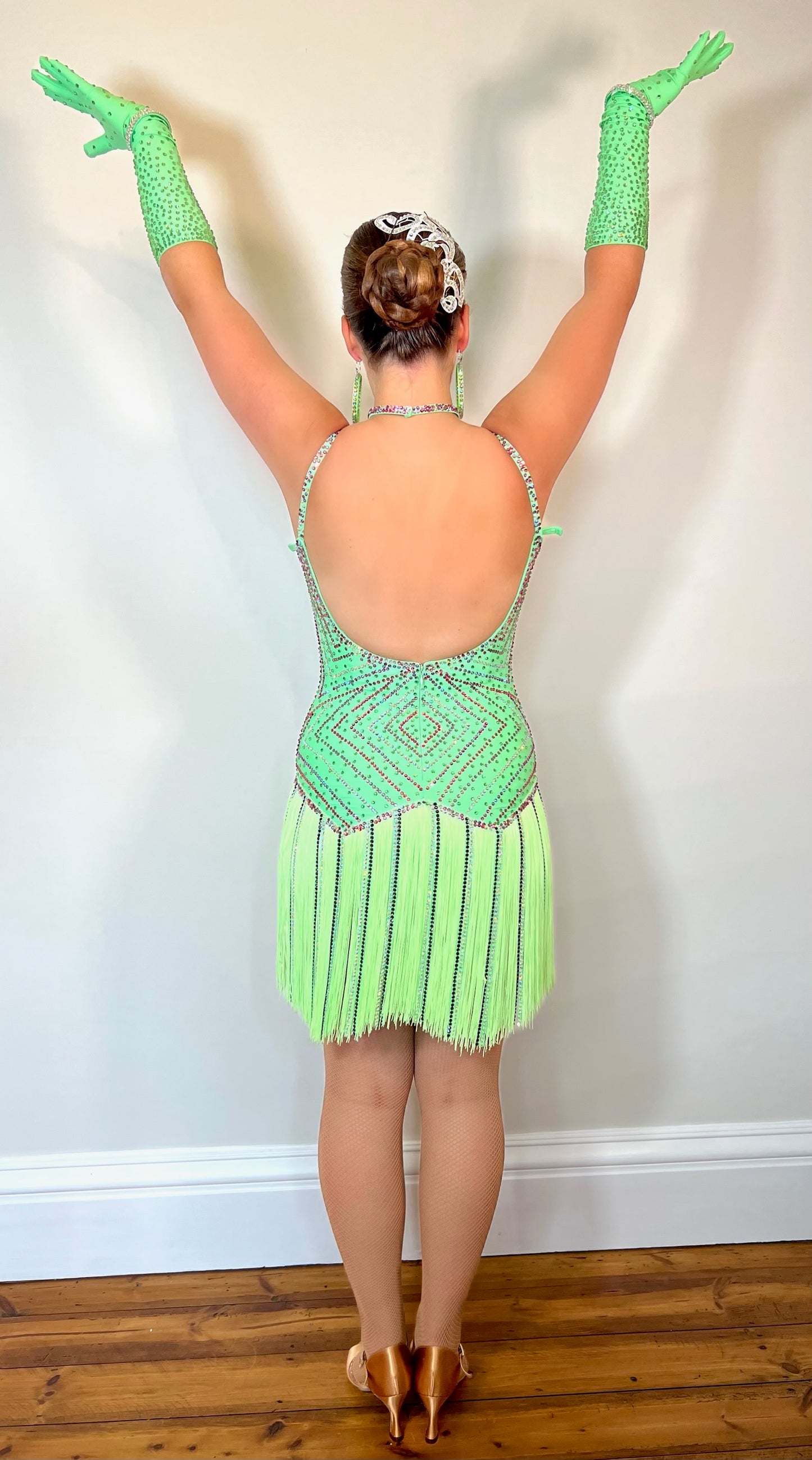 254 Flo Green, fringed skirt Latin Dress. Open detail to the front, with gloves. Decorated in multi coloured stones