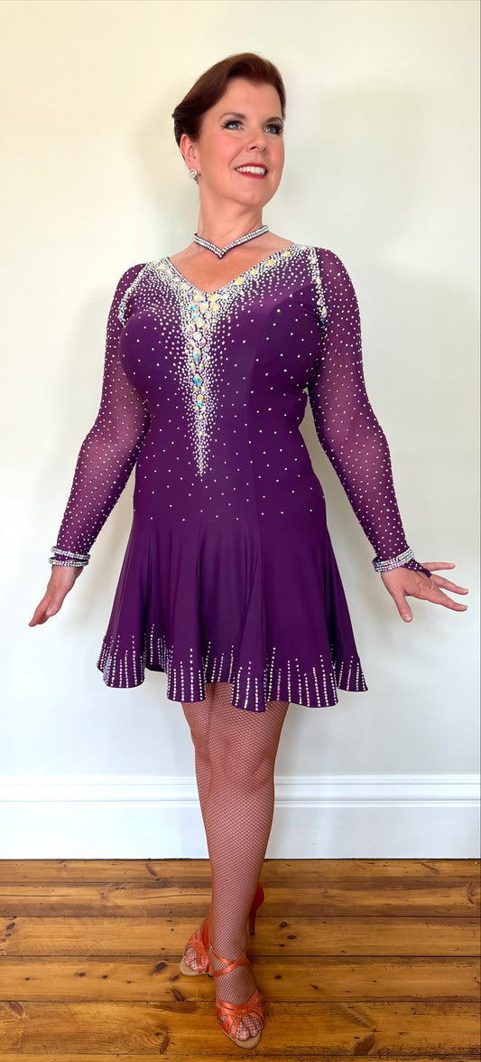307 Plum Competition Latin Dance Dress. Dress comes with optional belt. Stunning AB stoning to the front, back & hemline. Small Split to the left of the skirt.