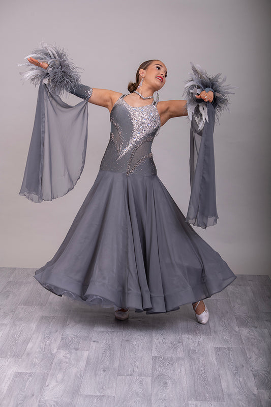 18B “TWD ELITE” Hematite Ballroom/Sequence Competition Dance Dress. new fuller skirts/underskirts. Heavily Stoned in AB, Moonlight & Jet Hematite. Detachable Floats & extra Feather Cuffs. Necklace with hanging details to the back.