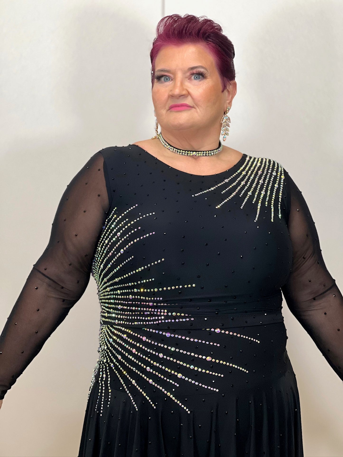 199 Flattering Black Latin Dance Dress. Super Stretchy. Stoned in AB starburst design with handkerchief hem skirt. High back giving option for wearing own bra.