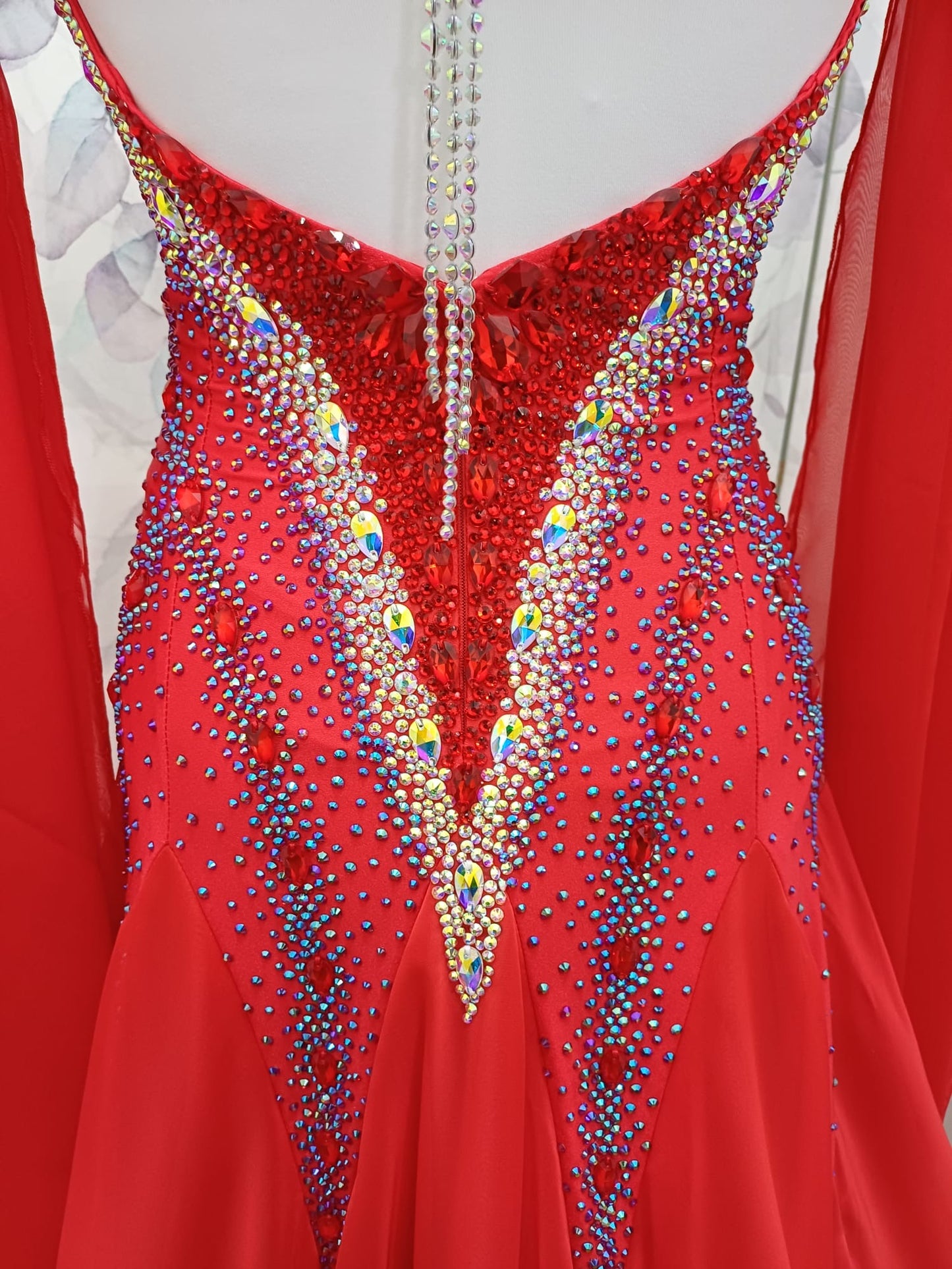 61B Bright Red Competition Ballroom/Sequence Dance Dress. Open detailing to the centre front, heavily stoned in Light Siam, AB & Siam AB. Beautiful Key hoke detail at neck. ❤️Showroom Appointments Available❤️