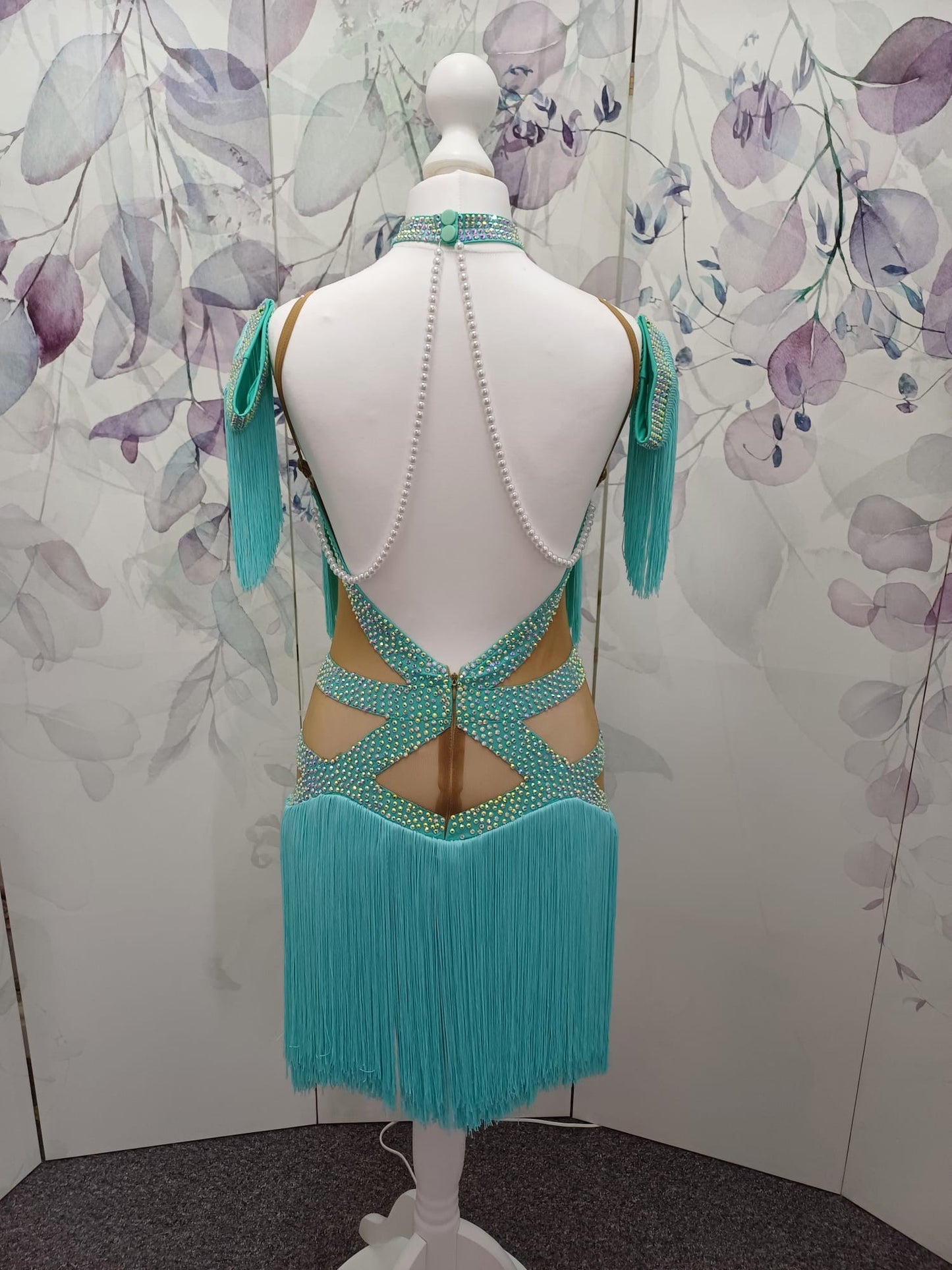 (BUDGET)8 Icey Blue Latin Competition Dance Dress. stoned AB & pearls. Flower to chest & hip, fringe skirts.                                           *****Our New Budget Range are Bought in ready made Costumes, with some detail added by TWDance*****