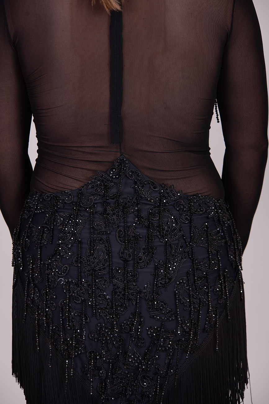 (BUDGET)15 Black Latin Competition Dance Dress. Stoned Black Motifs throughout with black bead droppers all over. High Back giving option to wear one bra. Cut out hips to get those legs out. Fringe to the hem of the skirt
