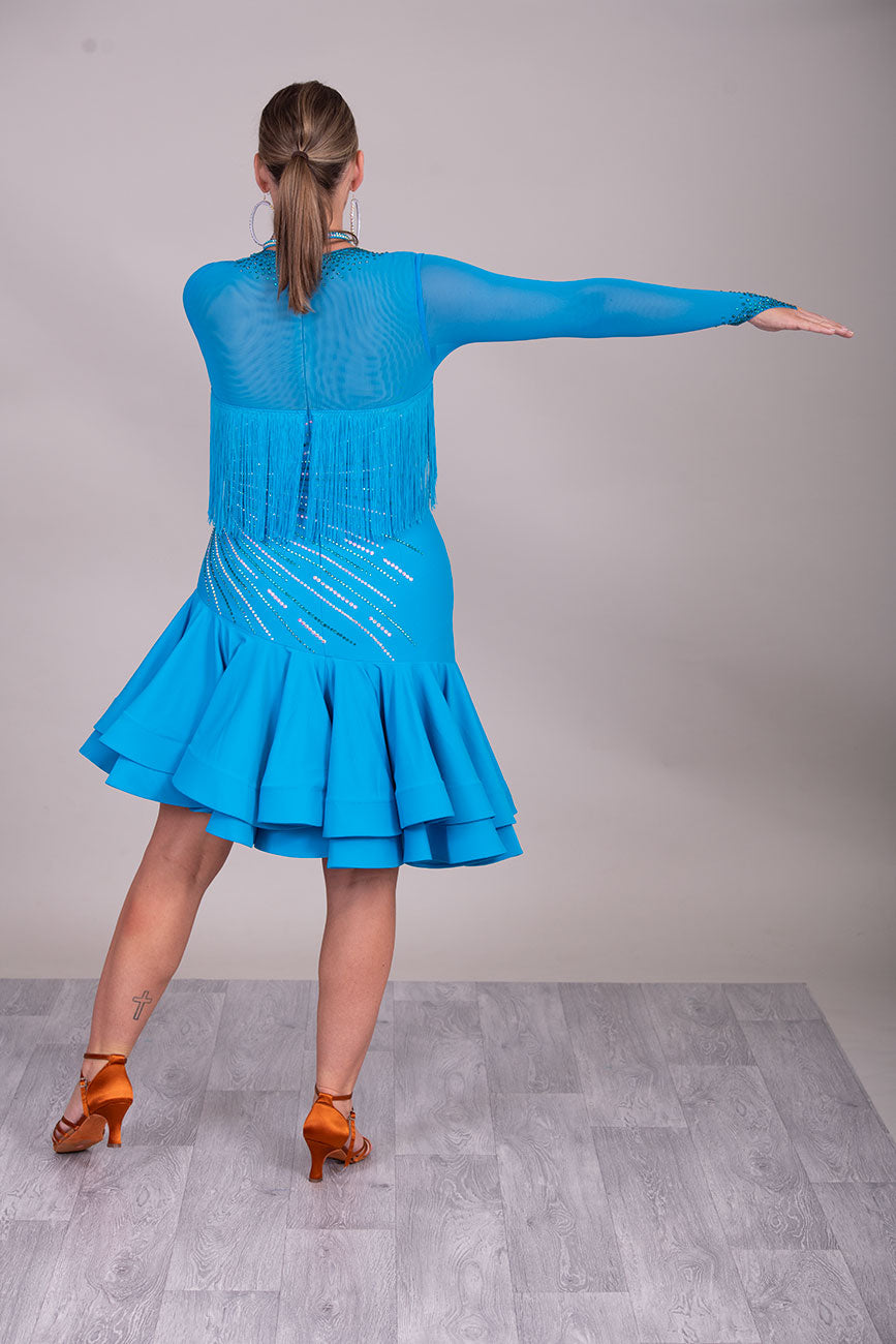 126L Gorgeous Blue Latin Competition Dance Dress. High Back allowing option to wear own Bra
Very flattering design to the tummy/hip with full deep frill skirts for maximum movement & fringes to the upper chest