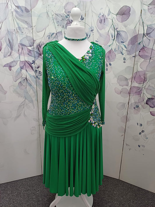 115L Emerald Green Competition Latin Dance Dress. Stunning dense stoning in AB, Emerald & Emerald AB. Sash details to the chest & Hip. High Back to give option of wearing own bra