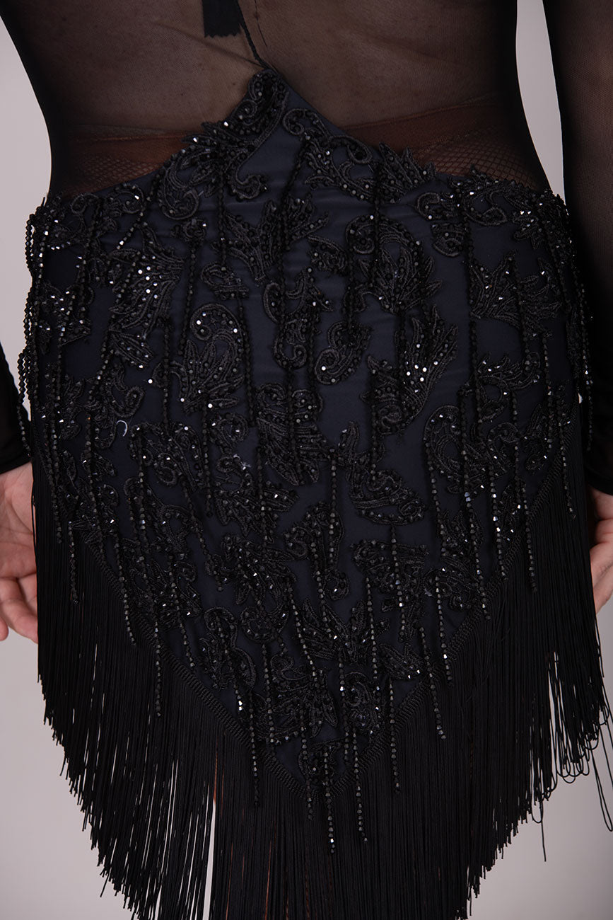 (BUDGET)15 Black Latin Competition Dance Dress. Stoned Black Motifs throughout with black bead droppers all over. High Back giving option to wear one bra. Cut out hips to get those legs out. Fringe to the hem of the skirt
