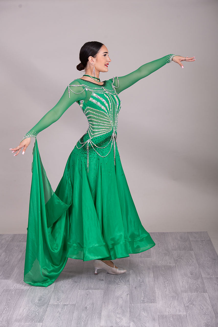 48B TWD “PETITE” Green Competition Ballroom Dance Dress. Beautiful hanging strap detail throughout. Stunning bodice design in AB & Emerald. ❤️Showroom Appointments Available❤️
