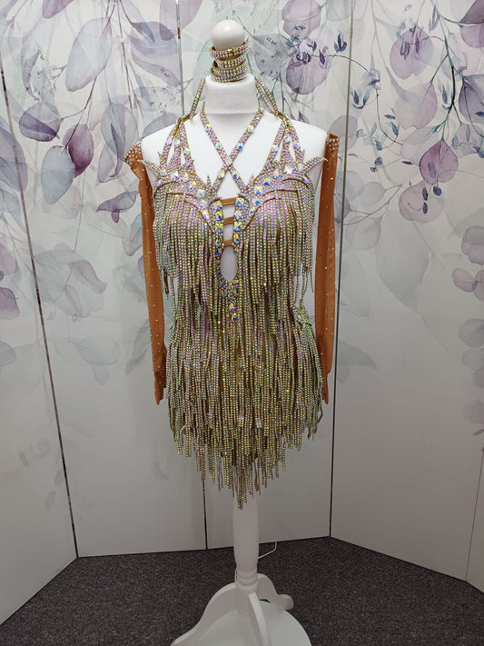67L TWD ELITE Stunning metallic gold Competition Latin Dance Dress. Heavily stoned fabric fringes in AB. Standout dress with tan gloves with fingers. ❤️Showroom Appointments Available❤️