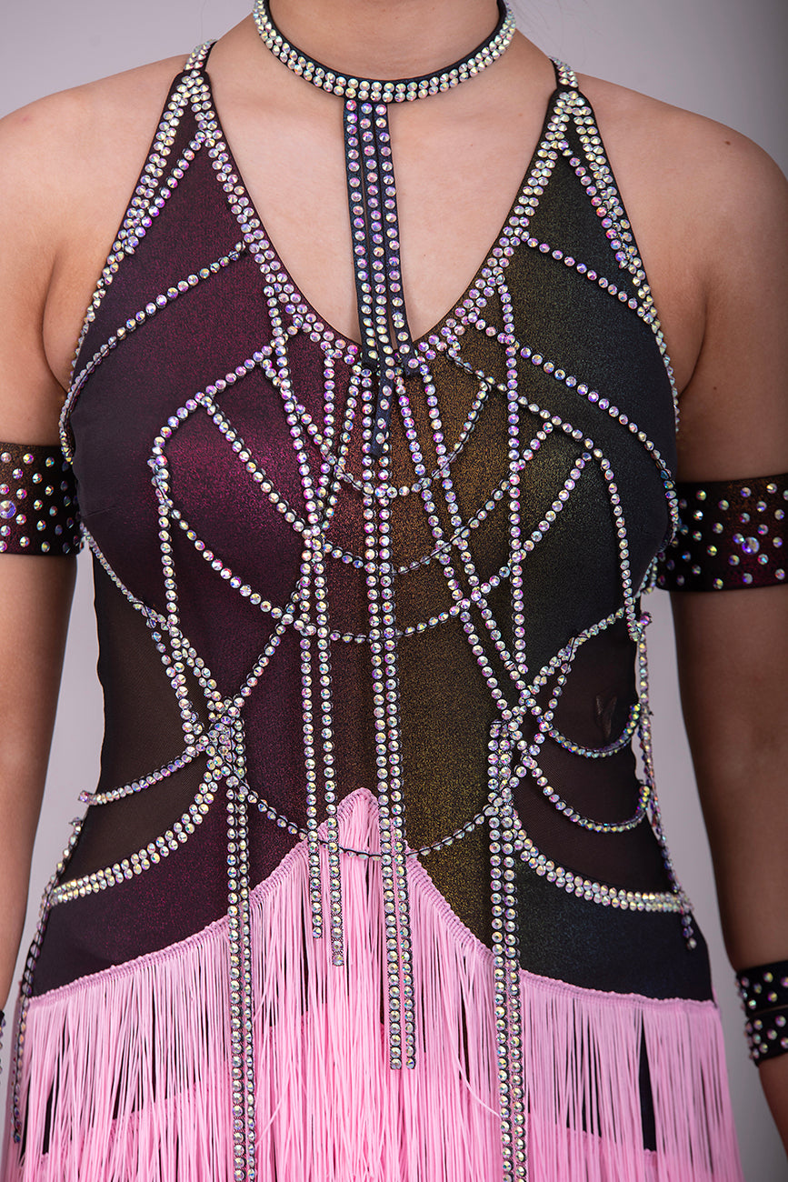 087 Black & Pink layered Fringe Latin Dress. Rainbow metallic bodice with stoned materials drapes & droppers. Backless dress with material droppers.