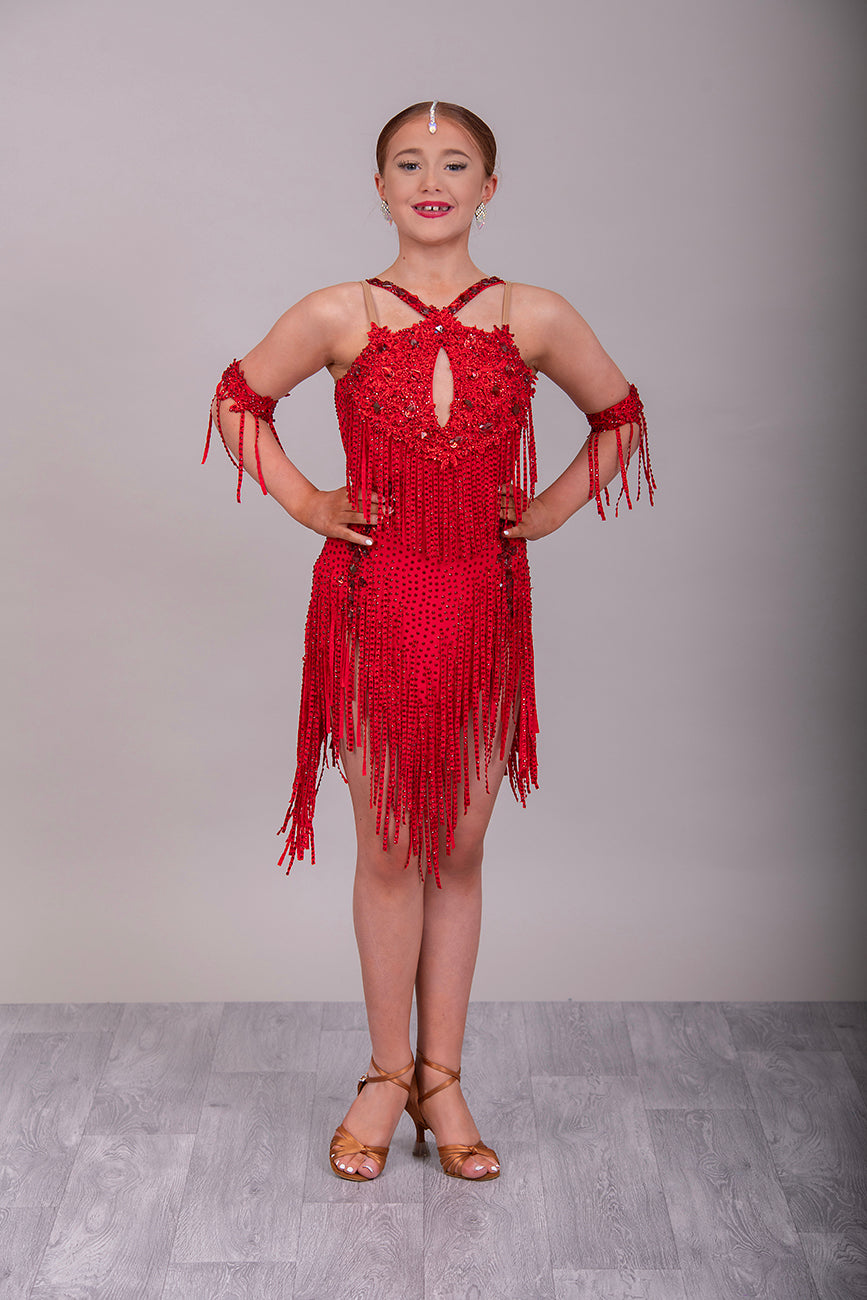 21L Red Latin Competition Dance Dress. Heavily stoned in Red with stoned fabric tassels & adjustable straps