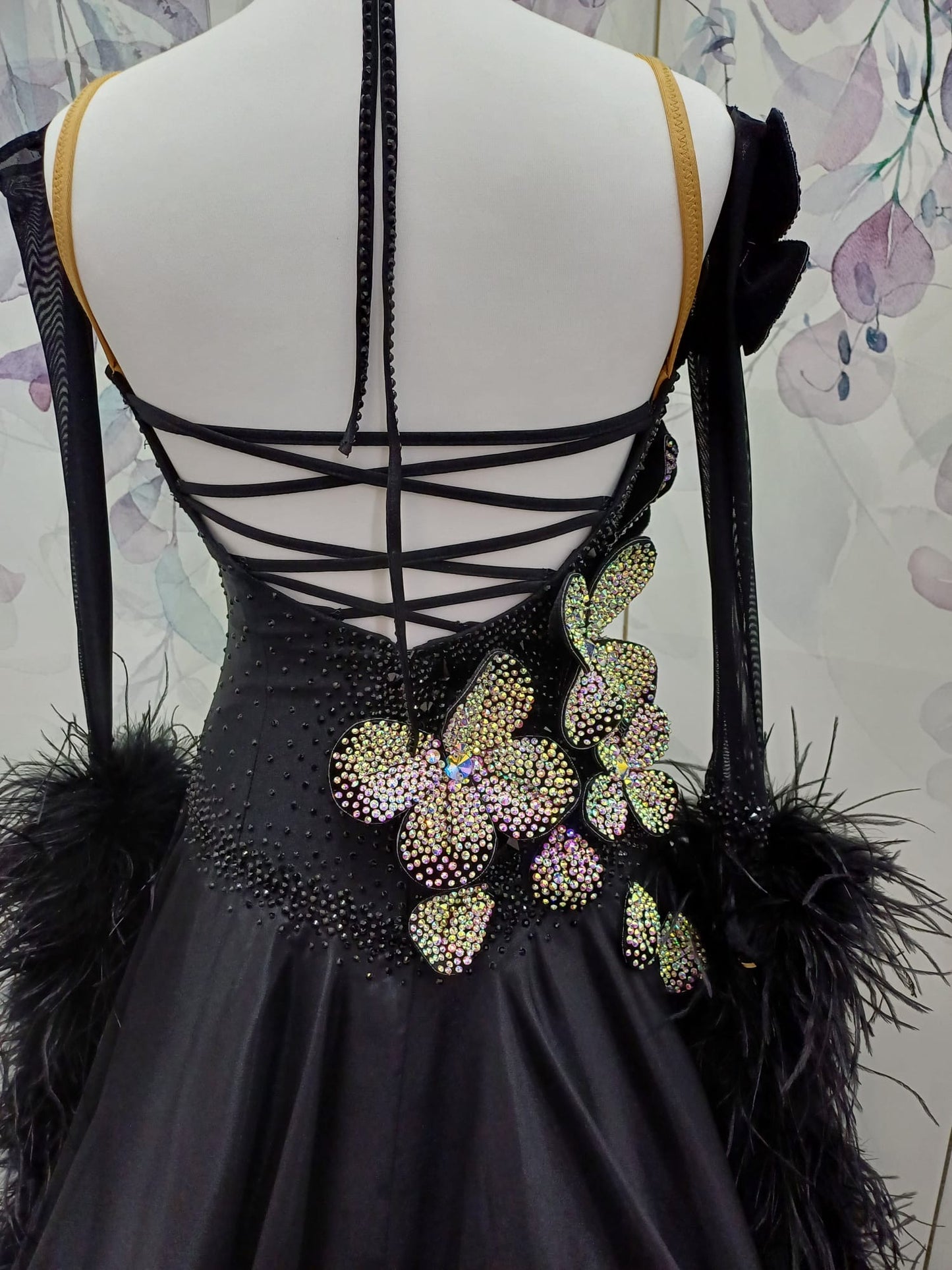 57B TWD “ELITE” Striking Black Ballroom/Sequence Competition Dance Dress. 3D Flowers heavily stoned in AB with Jet stoning throughout. Detachable Ostrich Feather Floats & Long Gloves ❤️Showroom Appointments Available❤️