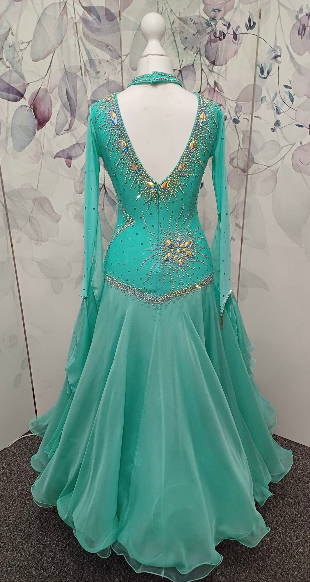 051. Stunning Mint Green Competition Ballroom Dance Dress. Heavily stoned in AB with Mesh detailing to the front. Detachable floats