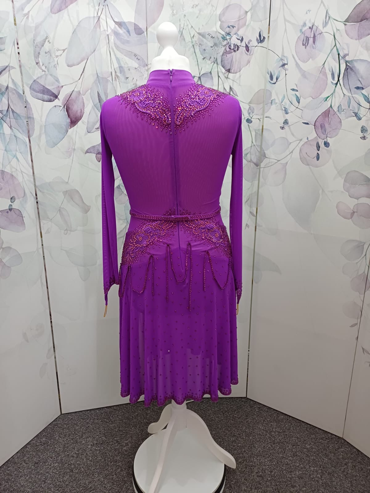 59L Hot Magenta Competition Latin Dance Dress.small split to front left. Very full skirt for maximum movement. High back to allow own bra option. Stunning stoned appliqués Strappy design waist/hip. Stoned in Fuschia & light Rose ❤️Showroom Appointments❤️