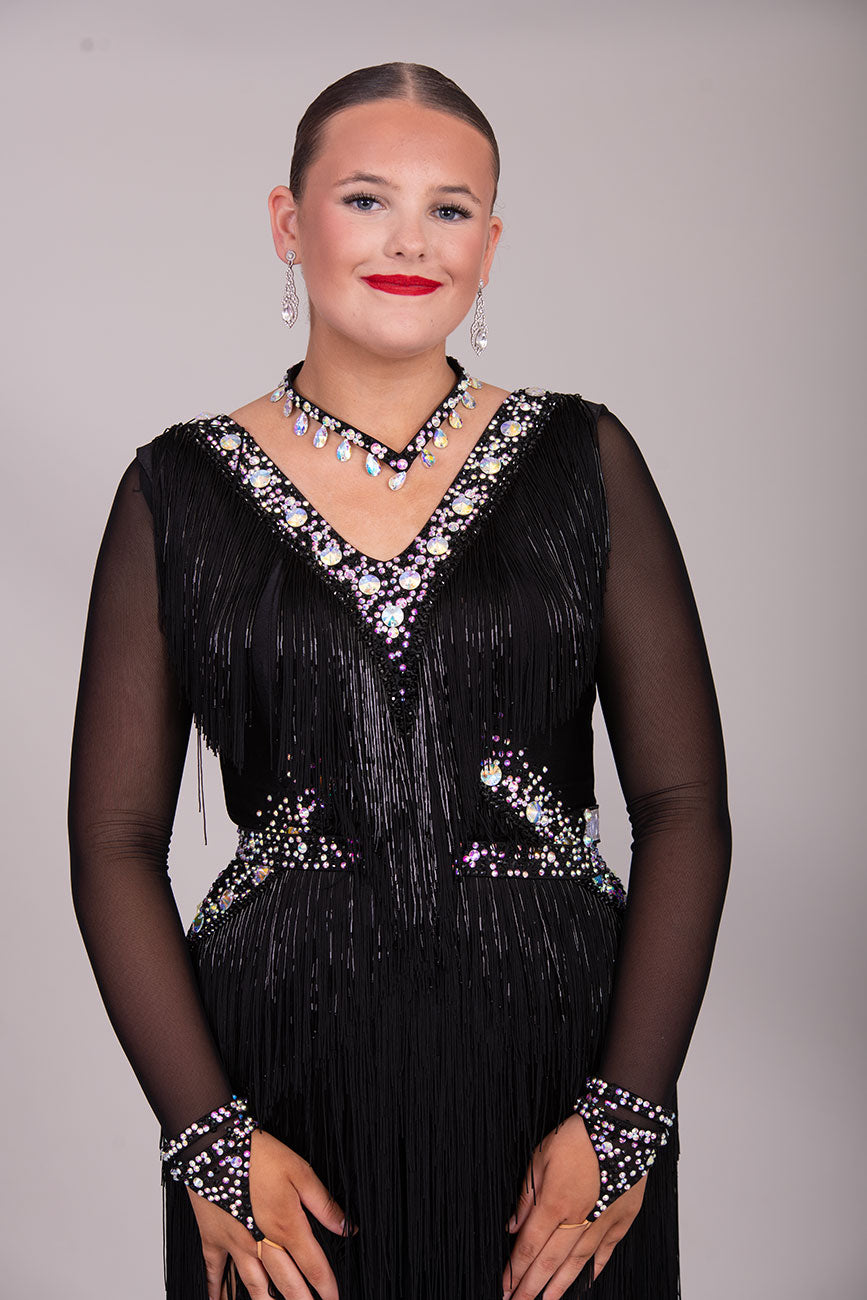 124L Latin Competition Dance Dress
High Back with option of wearing own Bra. Very full fringe to the chest & skirt. Stoned in jet & AB