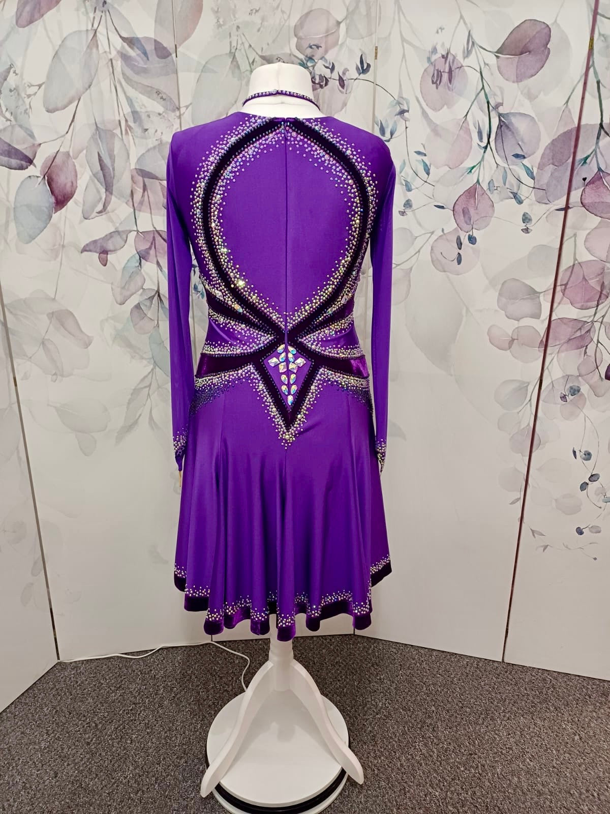 041 Cadbury Purple Competition Latin Dance Dress. Deep purple contrast pattern heavily stoned in AB & Amethyst AB. Bold & Flattering design. Full skirt giving maximum movement.