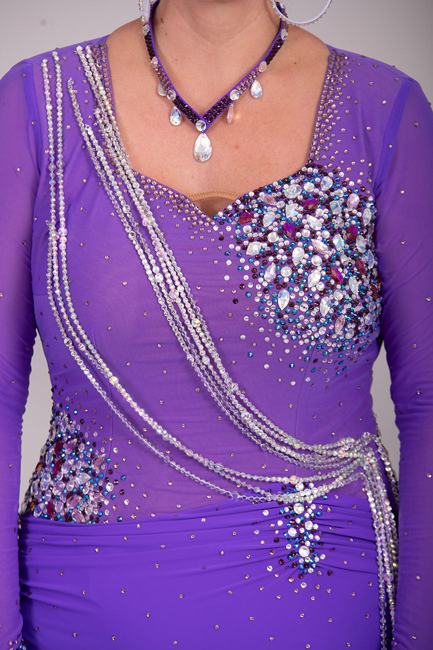 116L Stand Out Purple Competition Latin Dance Dress. Hanging strap detail to the front with stone detail in Purple velvet, AB & light amethyst AB.  High Back to give option of wearing own bra