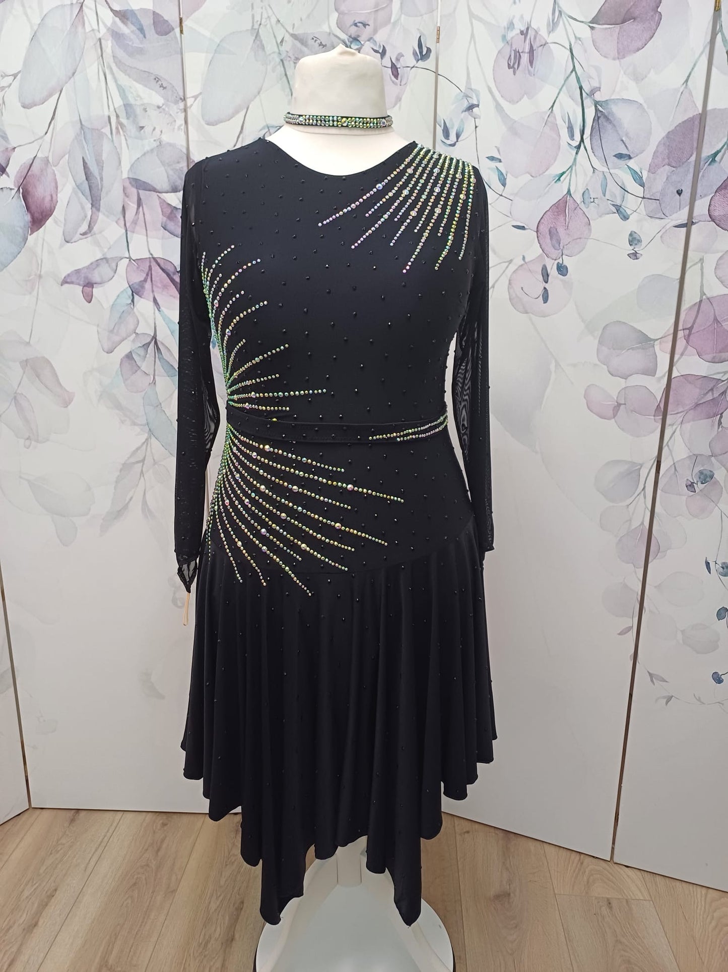 199 Flattering Black Latin Dance Dress. Super Stretchy. Stoned in AB starburst design with handkerchief hem skirt. High back giving option for wearing own bra.