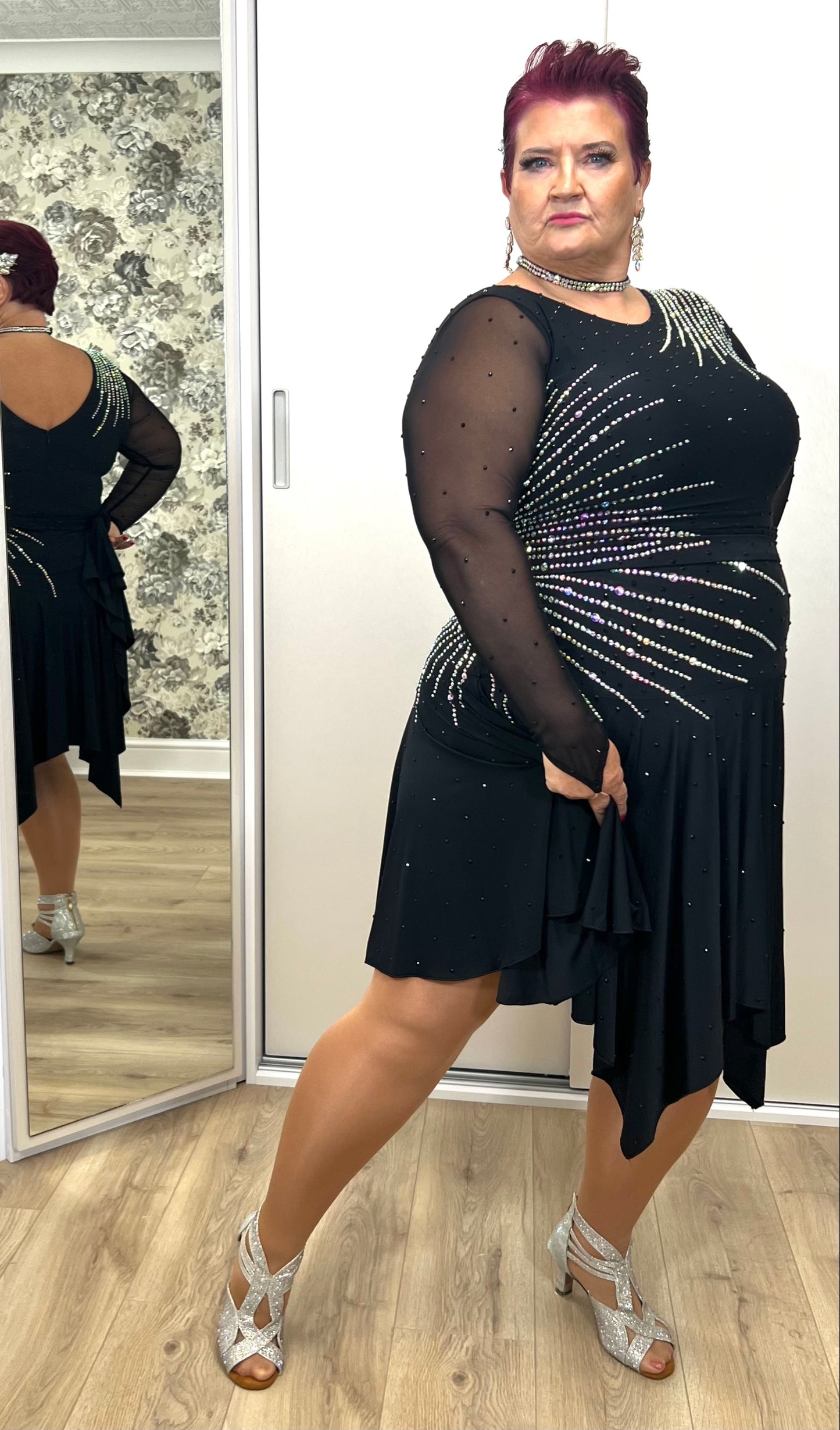 199 Flattering Black Latin Dance Dress. Super Stretchy. Stoned in AB starburst design with handkerchief hem skirt. High back giving option for wearing own bra.