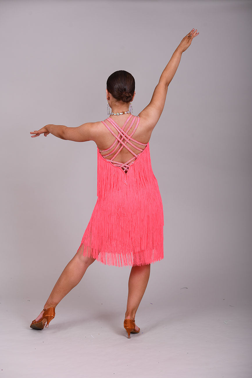 237 Bright Coral Fringed Dress. Decorated in AB stones with strapping detail to the shoulders & back. Matching Skirt, Floats & Belt available on request £135 extra