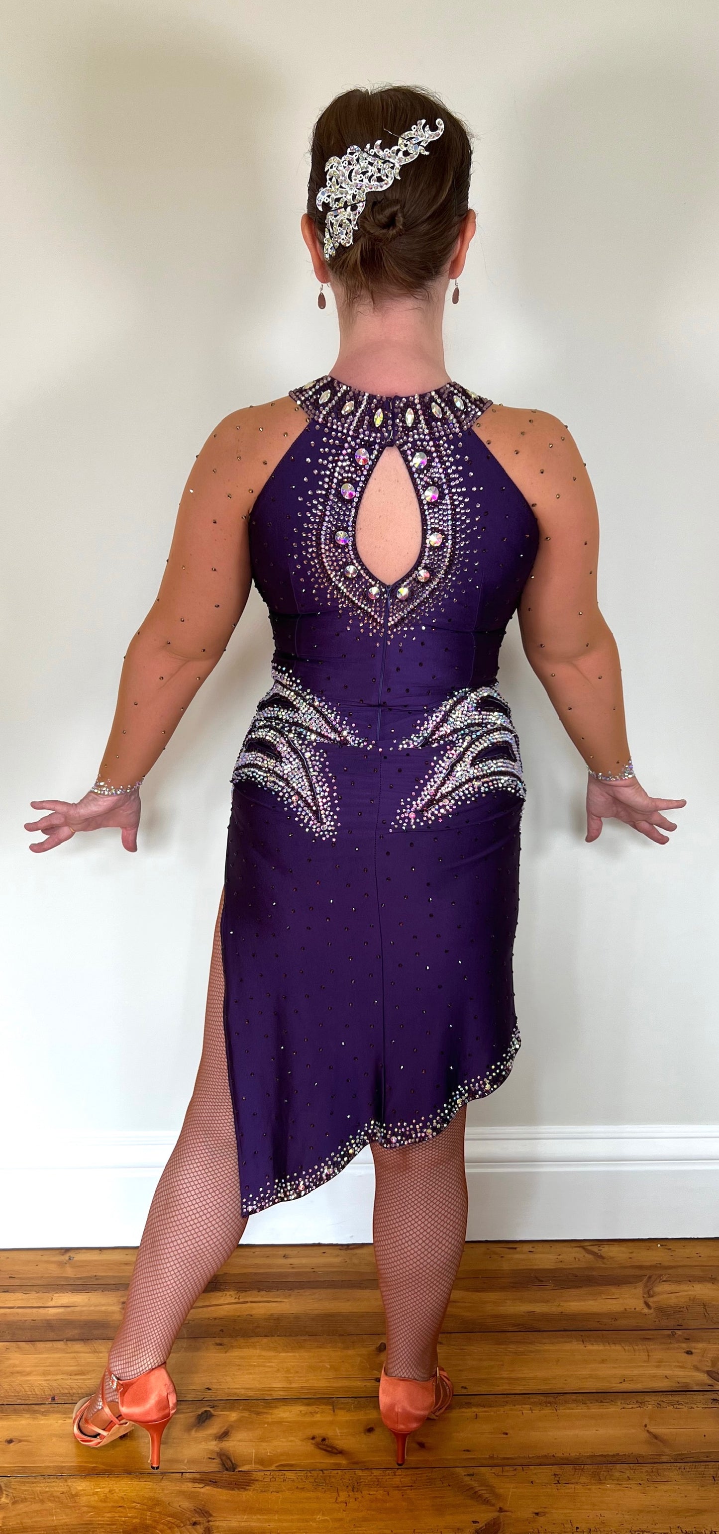 0002 Deep Purple Latin Dress. Heavily stoned in Amethyst, Light Amethyst & AB. Keyhole feature to the back, touching detail at the front.