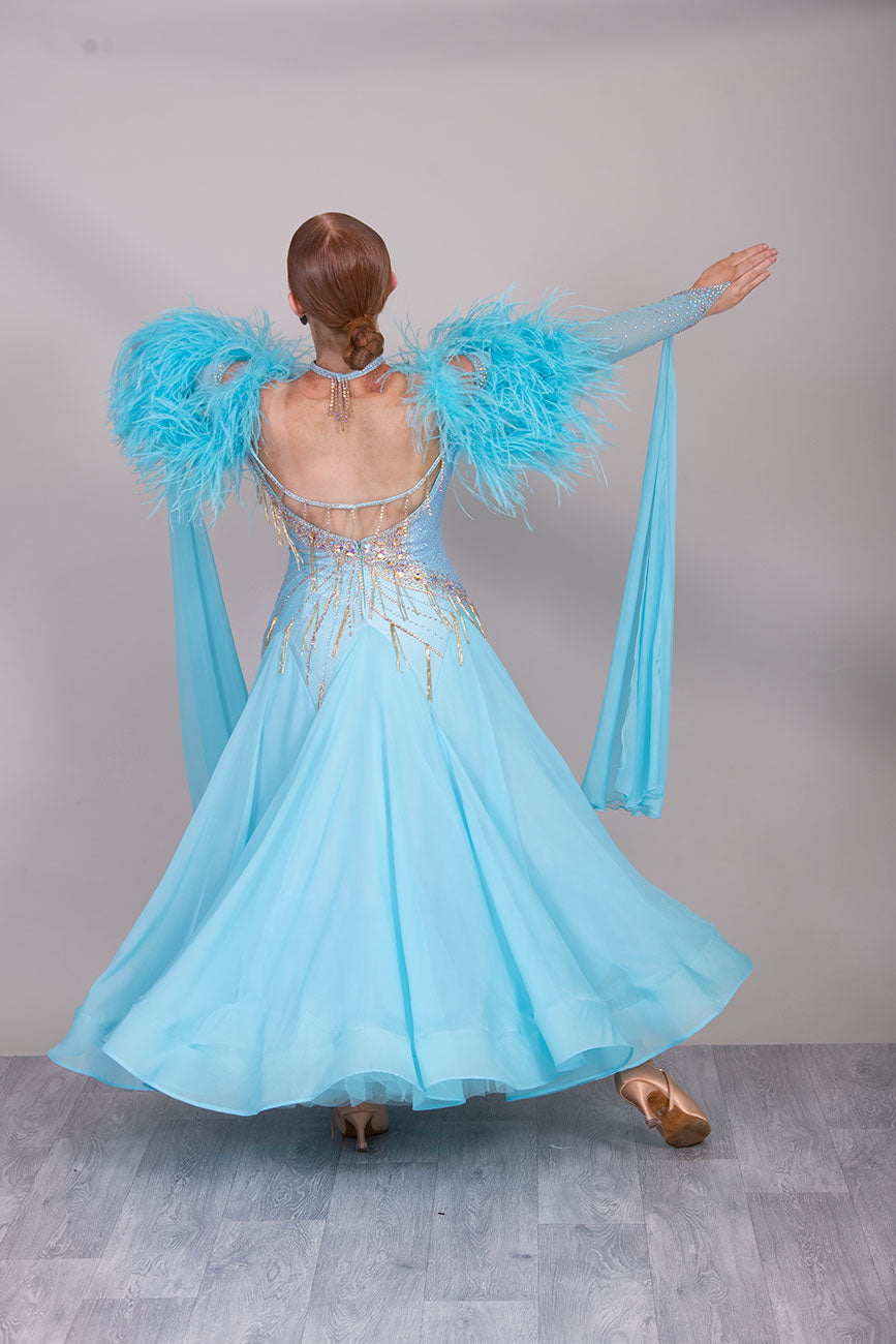 24B “TWD ELITE” New Full Skirts/Underskirts with Ostrich Feather sleeve detail. Stunning back design. Stoned in Crystal Golden Shadow with gold bead droppers. Detachable Floats