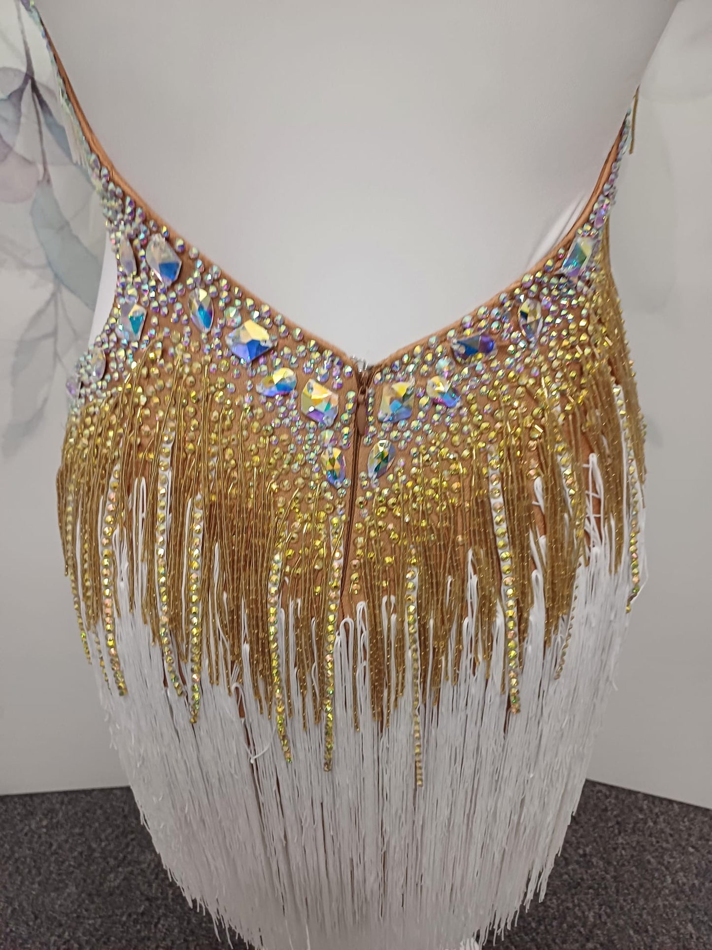 002 White & Gold full fringed Competition Latin Dance Dress. Heavily stoned with Gold & AB. Comes with Armbands & Bracelets. Very full fringes with stoned fabric strips added.