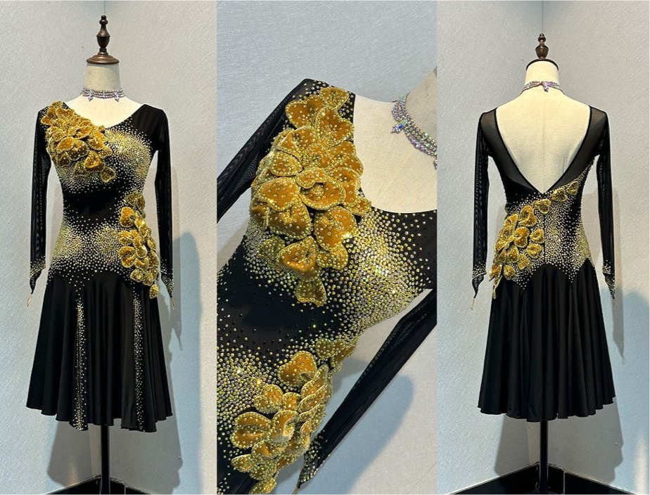 44L TWD ELITE Black & Gold Competition Latin Dance Dress. Heavily stoned with 3D Detailing to the Hip & Chest. 2 Front Splits for extra movement. Showroom Appointments Available❤️