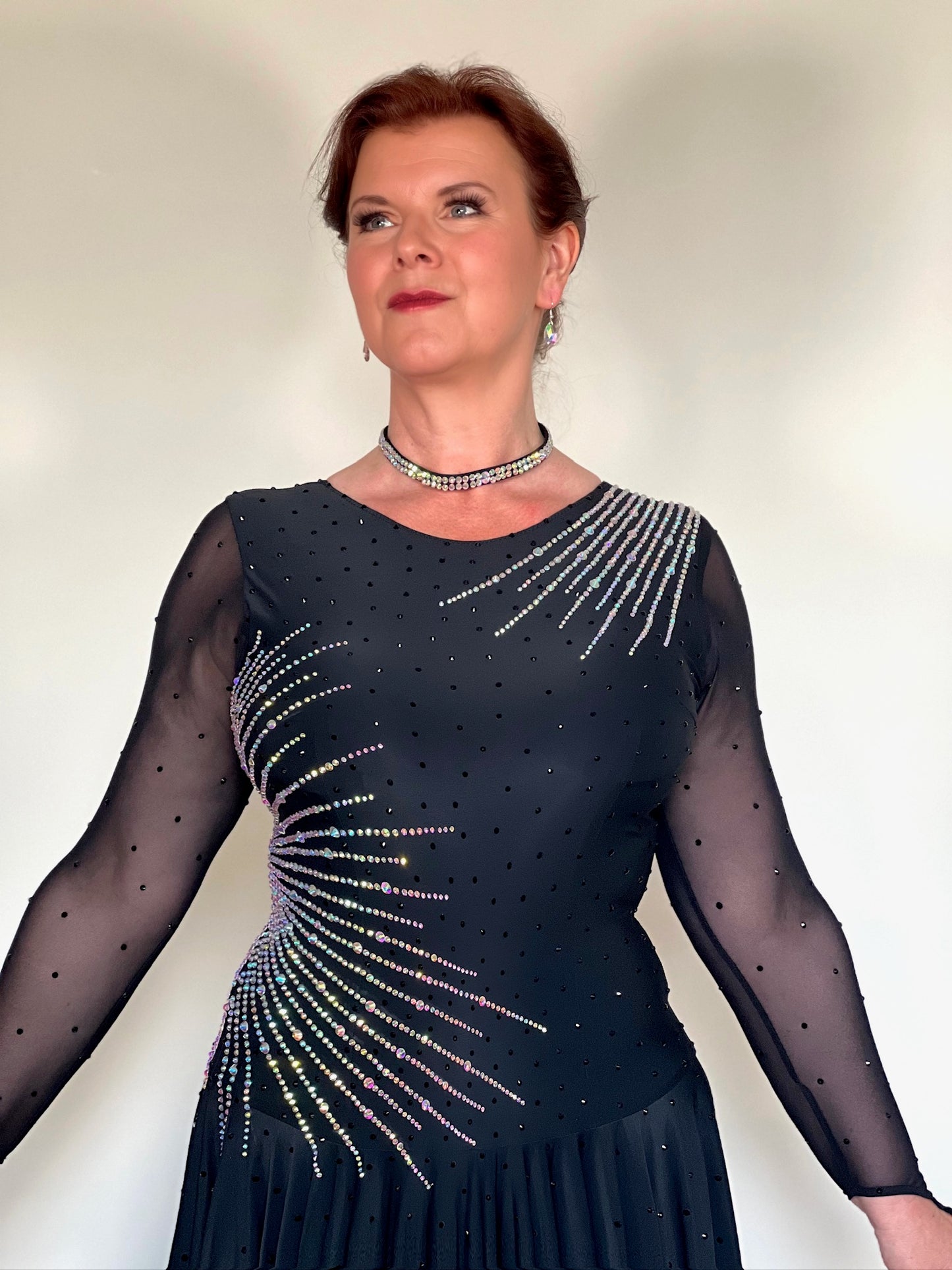 199 Flattering Black Latin Dance Dress. Super Stretchy. Stoned in AB starburst design with handkerchief hem skirt. High back giving option for wearing own bra.