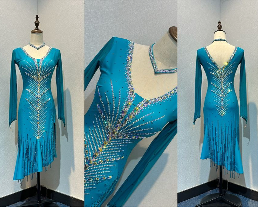 54L Striking Teal Competition Latin Dance Dress. Heavily stoned in AB & Teal. Split detail to one side. High back giving option to wear own bra. ❤️Showroom Appointments Available❤️