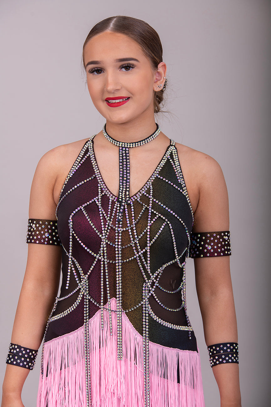 087 Black & Pink layered Fringe Latin Dress. Rainbow metallic bodice with stoned materials drapes & droppers. Backless dress with material droppers.