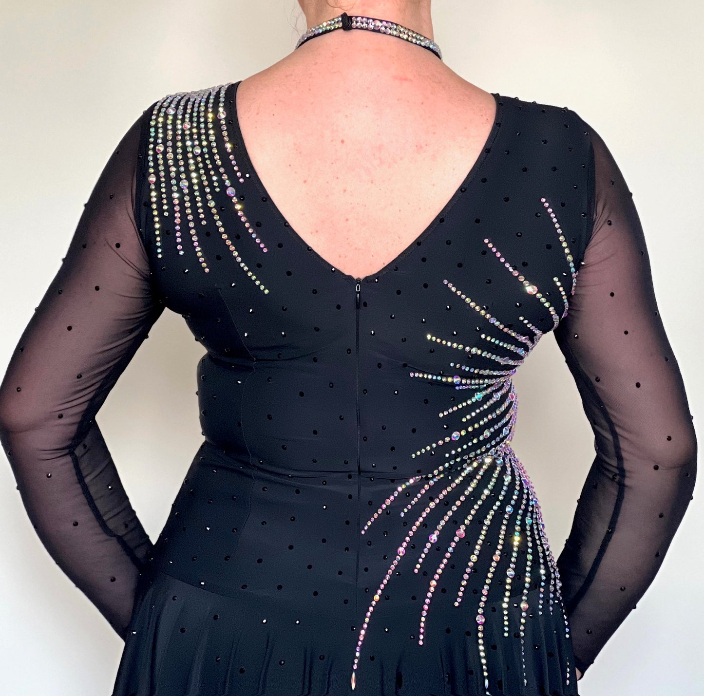 199 Flattering Black Latin Dance Dress. Super Stretchy. Stoned in AB starburst design with handkerchief hem skirt. High back giving option for wearing own bra.