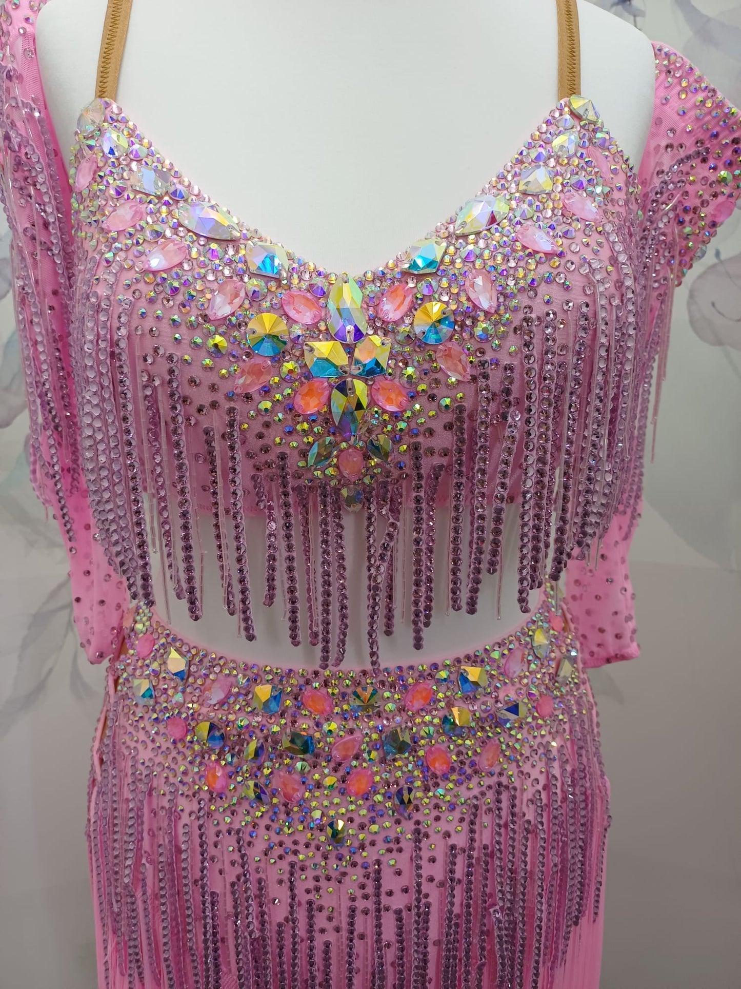 49L Bubblegum Pink Latin Competition 2 piece Dress. Stoned in light rose & bright pink. Stoned fabric droppers throughout. Separate gloves included stoned to match the dress. Length can be shortened to suit. ❤️Showroom Appointments Available❤️