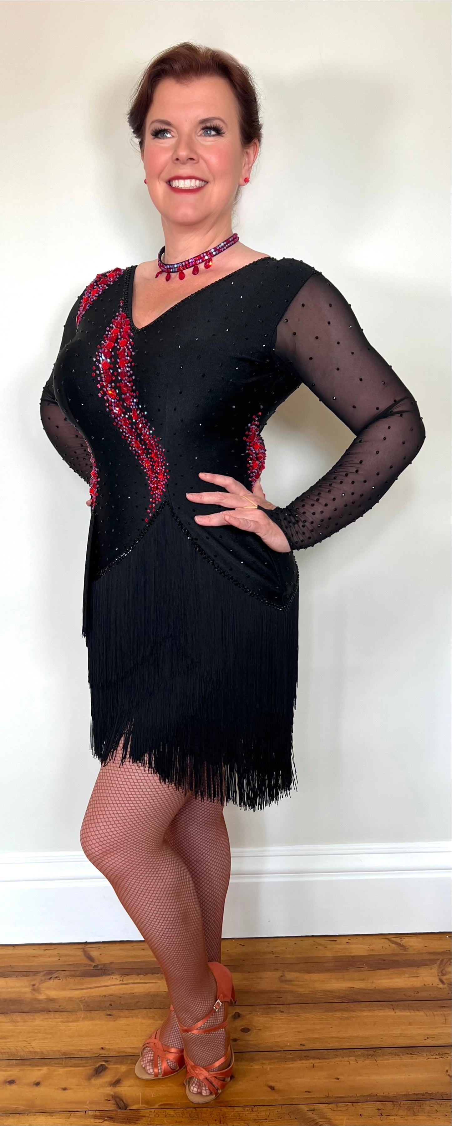 283 Black & Fuschia Pink Latin Dance Dress. Black Fringe detailed skirt design. Stoned in Red, Red AB & Jet. High back to wear own bra if needed.