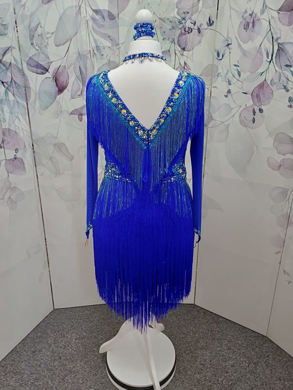 53L Cobalt Blue Competition Latin Dance Dress. Very full fringed skirts with bead droppers to the upper chest & Hip in a contrasting turquoise blue. Heavily stoned in Sapphire & Light Sapphire. ❤️Showroom Appointments Available❤️
