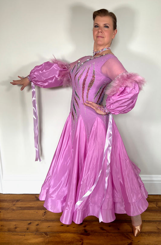 320 Beautiful Competition Ballroom Dance Dress. Beautiful stoning with detachable puff cuffs with ribbons & feathers. High back to wear own bra if required.