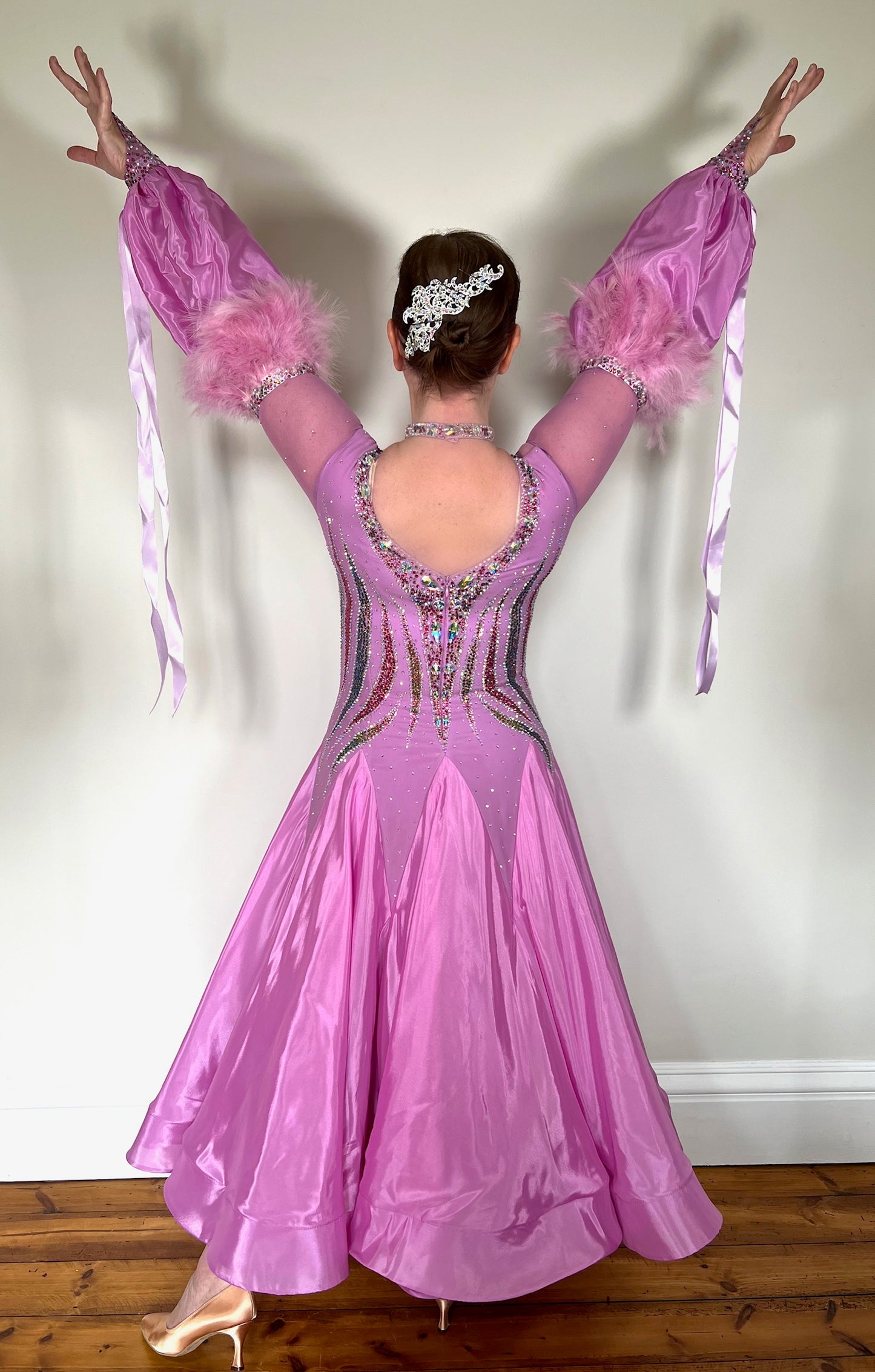 320 Beautiful Competition Ballroom Dance Dress. Beautiful stoning with detachable puff cuffs with ribbons & feathers. High back to wear own bra if required.